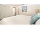 Bright bedroom with a comfortable bed, decorative pillows, and closet with louvered doors at 1018 Charlotte Ave, Sarasota, FL 34237