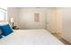 Bedroom features a comfortable bed, decorative accents, and access to the rest of the house at 1018 Charlotte Ave, Sarasota, FL 34237