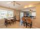 Charming dining area with seating and a view of the living room at 113 8Th S St, Bradenton Beach, FL 34217