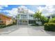 Charming home with a rooftop deck, beautiful landscaping, and ample parking at 113 8Th S St, Bradenton Beach, FL 34217