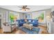 Cozy living room with comfortable seating, hardwood floors, and abundant natural light at 113 8Th S St, Bradenton Beach, FL 34217