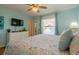 Relaxing main bedroom featuring ample space, natural light, and stylish accents at 113 8Th S St, Bradenton Beach, FL 34217