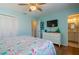 Comfortable bedroom with light walls, and an ensuite bathroom at 113 8Th S St, Bradenton Beach, FL 34217