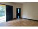 Bright living room with tile flooring and a sliding door leading to the pool at 11516 Sweetflag Dr, Lakewood Ranch, FL 34202