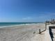 Expansive beach with clear turquoise ocean and blue sky at 1190 Shore View Dr # C, Englewood, FL 34223