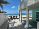 Outdoor patio with grill overlooking ocean at 1190 Shore View Dr # C, Englewood, FL 34223
