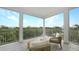 Outdoor seating area with a scenic view of trees, water and blue sky at 12415 Dockside Ter, Cortez, FL 34215