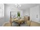Bright dining area featuring a table, chairs, and an open layout at 12415 Dockside Ter, Cortez, FL 34215