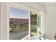 Bright window showcases serene waterfront views with boats docked along the canal at 1250 N Portofino Dr # 304, Sarasota, FL 34242