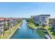 Waterfront condo community with boat docks, beautifully landscaped grounds, and tranquil canal views at 1250 N Portofino Dr # 304, Sarasota, FL 34242