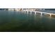 An aerial photograph showing a long bridge that goes over water, with the city in the distance at 1350 40Th St, Sarasota, FL 34234
