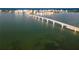 An aerial view highlights a bridge spanning across the water with a city skyline visible in the background at 1350 40Th St, Sarasota, FL 34234