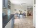Bright dining area showcasing tile flooring, decorative niches, and a view into adjacent living spaces at 1350 40Th St, Sarasota, FL 34234