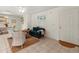 Bright living space featuring tile floors, ceiling fan, and a white interior door at 1350 40Th St, Sarasota, FL 34234