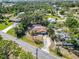 Charming single-story home with a private screened pool and lush landscaping at 1621 Overbrook Rd, Englewood, FL 34223