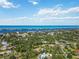 Stunning aerial view of a beautiful community with waterfront access and lush green surroundings at 1621 Overbrook Rd, Englewood, FL 34223