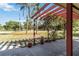 Covered patio overlooking the nicely landscaped front yard at 1621 Overbrook Rd, Englewood, FL 34223