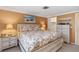 Comfortable bedroom with coastal decor, spacious layout, and plenty of natural light at 1621 Overbrook Rd, Englewood, FL 34223