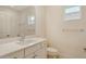 Bathroom features a vanity and toilet at 18249 Vizcaya Ct, Venice, FL 34293