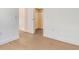 Bedroom with wood floors leads to closet at 18249 Vizcaya Ct, Venice, FL 34293