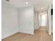 Hallway features wood floors and white trim at 18249 Vizcaya Ct, Venice, FL 34293
