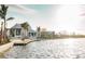 Exterior view of the community clubhouse and lakefront area at 20655 Valprato Ct, Venice, FL 34293
