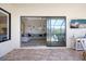 Inviting outdoor patio featuring brick flooring and seamless access to the living area with stylish furniture at 20655 Valprato Ct, Venice, FL 34293
