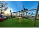 Modern playground with rope climbing structures offers a fun and active play area for children at 20655 Valprato Ct, Venice, FL 34293