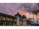 Exterior view of a Naples restaurant with evening sky, street view, palm trees at 20655 Valprato Ct, Venice, FL 34293