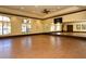 Spacious studio room with a mirror wall, ideal for dance, yoga, or other fitness activities at 20655 Valprato Ct, Venice, FL 34293