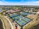 View of the community tennis and pickleball courts near the community center, offering recreational options at 20655 Valprato Ct, Venice, FL 34293