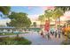 Vibrant town center with dining, outdoor seating, and lush landscaping at 20655 Valprato Ct, Venice, FL 34293