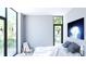 Bright bedroom featuring lots of windows with lush landscaping views, and neutral decor at 2170 Robinhood St # A1-304, Sarasota, FL 34231