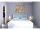 This modern bedroom features a large bed and a minimalist design, perfect for relaxing at 2170 Robinhood St # A1-304, Sarasota, FL 34231