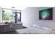 This modern bedroom features a sleek desk area, large window, and modern decor, great for work or relaxation at 2170 Robinhood St # A1-304, Sarasota, FL 34231