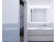 Elegant bathroom features a wood vanity, sleek mirror, and modern lighting for a spa-like feel at 2170 Robinhood St # C1-409, Sarasota, FL 34231