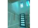 Spacious foyer featuring a modern front door and several windows, offering natural light and a contemporary design at 2483 Bay St, Sarasota, FL 34237