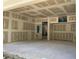 Spacious garage with high ceilings and ample room for storage and parking at 2483 Bay St, Sarasota, FL 34237