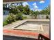 Backyard view featuring a new pool under construction with landscaping at 2483 Bay St, Sarasota, FL 34237