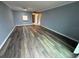 Sunlit living room with hardwood floors and neutral tones at 2700 Coconut Bay Ln # 432, Sarasota, FL 34237