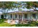 Inviting home exterior with columns and shuttered windows at 2961 Valencia Rd, Venice, FL 34293