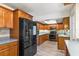 Modern kitchen with stainless steel smart refrigerator and plenty of storage at 2961 Valencia Rd, Venice, FL 34293