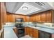 Charming kitchen with updated appliances, cabinets, and spacious countertop and cabinet space at 2961 Valencia Rd, Venice, FL 34293