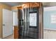 Gourmet kitchen featuring a smart refrigerator and access to the living room at 2961 Valencia Rd, Venice, FL 34293