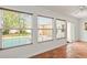 Light-filled sunroom with tile floors and views of the backyard pool at 2961 Valencia Rd, Venice, FL 34293