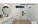 Modern bathroom features a glass enclosed shower, sleek fixtures, and a vanity at 305 73Rd St, Holmes Beach, FL 34217