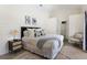 Charming bedroom boasts a king bed, wood-look floors, and decorative accents at 305 73Rd St, Holmes Beach, FL 34217