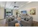 Comfortable living room with wood floors, ceiling beams, and modern decor at 305 73Rd St, Holmes Beach, FL 34217