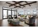 Elegant living room with modern furniture, wooden floors and ocean view at 4050 Higel Ave, Sarasota, FL 34242
