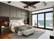 Serene main bedroom with waterfront view and luxurious decor, creates a relaxing atmosphere at 4050 Higel Ave, Sarasota, FL 34242